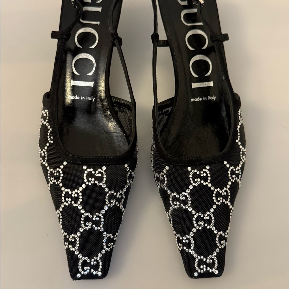 Black Gucci kitten heels with silver rhinestones